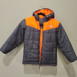 Boys Reversible North Face jacket.